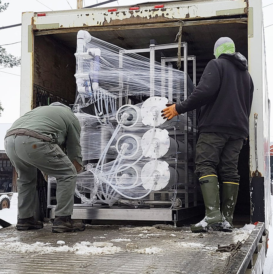 Our newe Reverse Osmosis machine being unloaded.