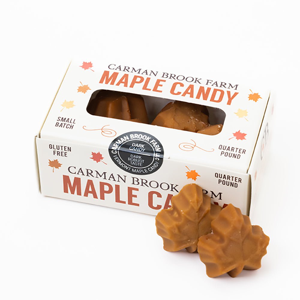 Dark robust maple candy in a quarter-pound box in pumpkins, turkeys, and maple leaves for Thanksgiving..