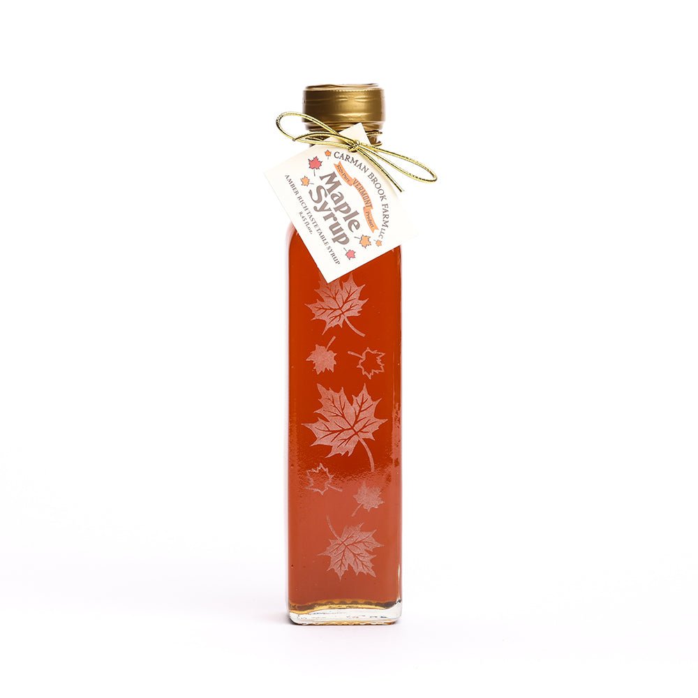 Autumn leaf maple syrup bottle filled with Amber Rich Taste maple syrup from Carman Brook Farm.