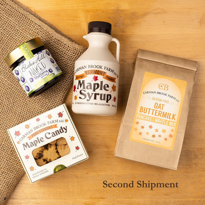 The second shipment has a pint of amber rich taste maple syrup and a half pound of light maple candies with blueberry jam and a package of gluten free waffle mix.