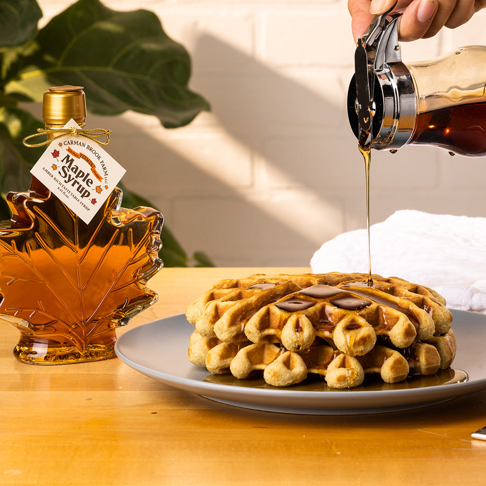 Carman Brook Farm maple syrup poured over Belgian waffles, click here for the recipe to make your own belgian waffles. 